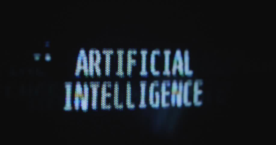 Close up of pixelated black and white lettering on flickering television screen spelling artificial intelligence