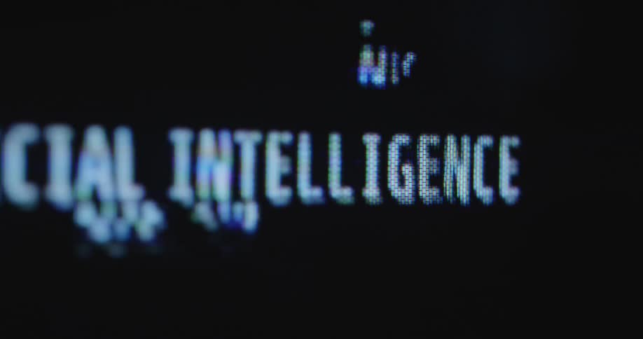 The words artificial intelligence flashing on a retro computer screen with glitches and distortion