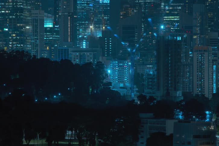 Time lapse of skyscrapers construction in the city at night