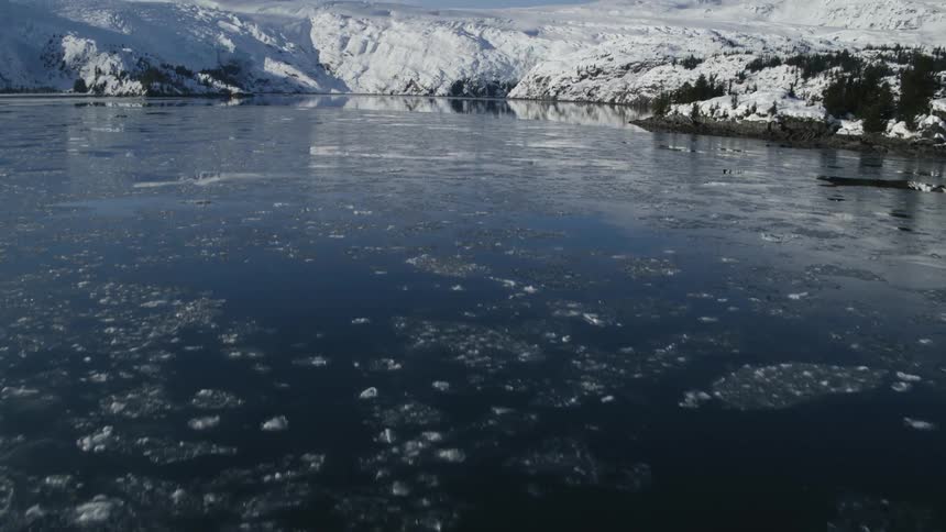 Large chunks of slushy ice in a body of water