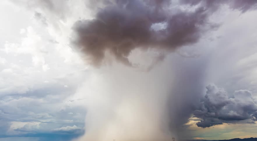 A monsoon thunderstorm dropping a large downburst of rain and hail