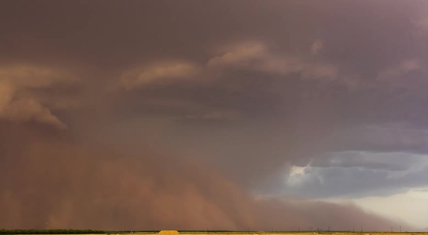 A large dust storm swallows the landscape
