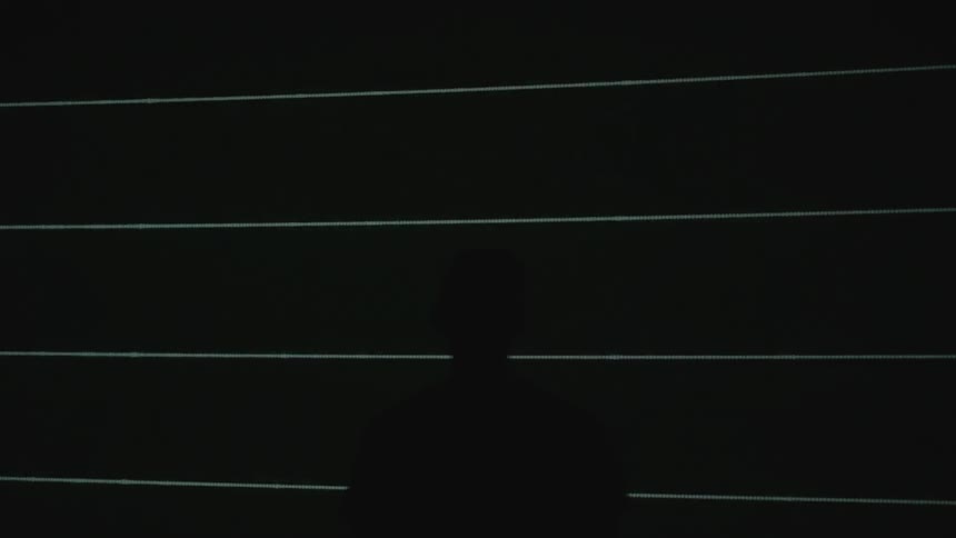 The shadow of a man on the wall