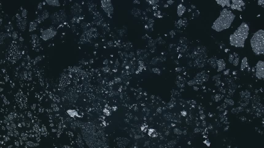 Aerial view of ice and snow on a body of water