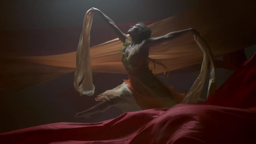 A woman jumps in the air