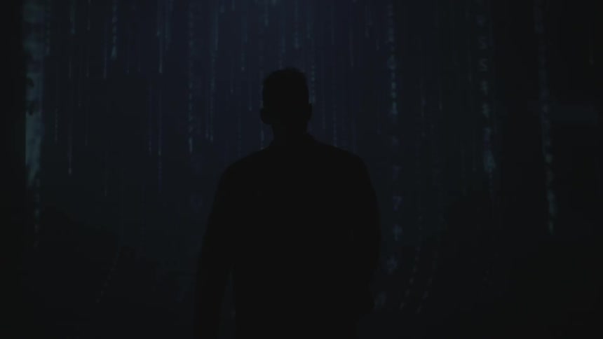 A man reaches towards a projected image