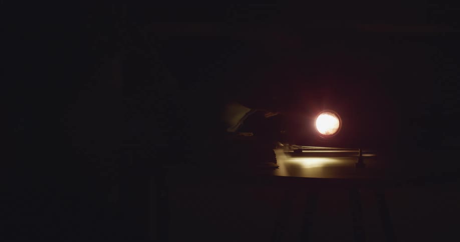 A bright light glowing in darkness