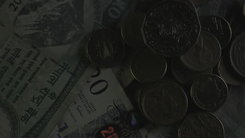 Various coins and paper currency