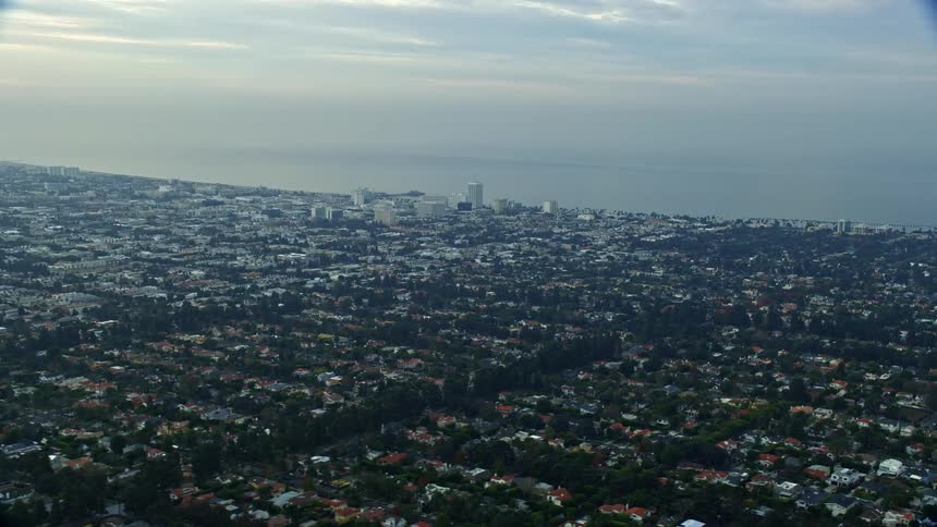 Aerial footage of a residential neighborhood at sunrise over Santa Monicas West Side California