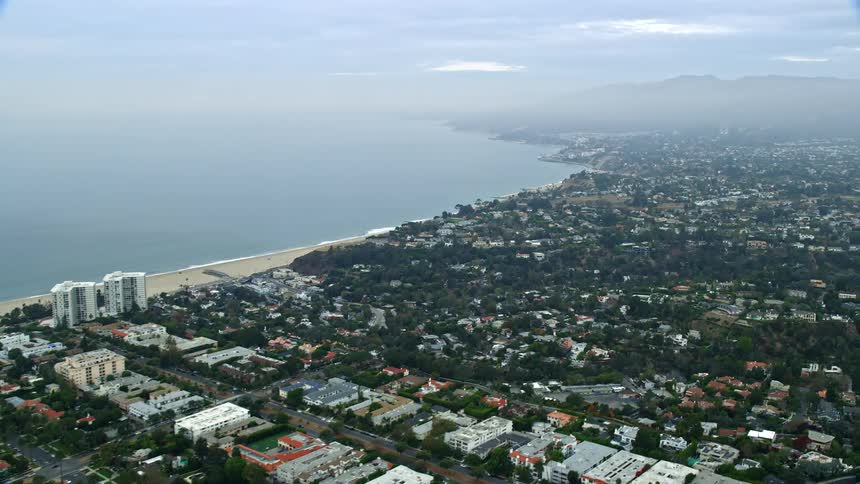 Aerial shot of Santa Monica and Pacific Palisades residential areas during a cloudy morning