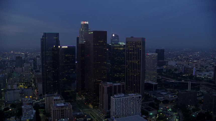 Aerial footage captures the towering skyscrapers of Downtown LA at sunrise in California during winter revealing the epic skyline of the city