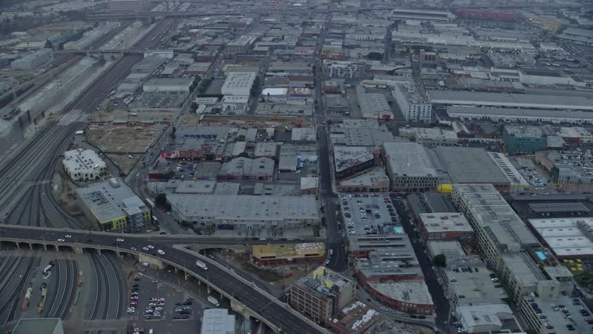 Aerial view of warehouse buildings in Downtown LA Arts District during sunrise