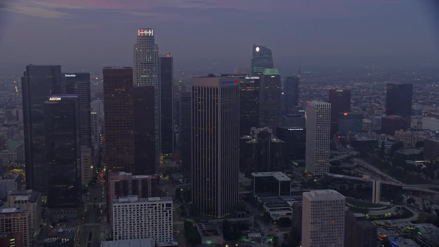 Aerial view of Downtown Los Angeles California featuring the US Bank Tower and other skyscrapers during early morning hours