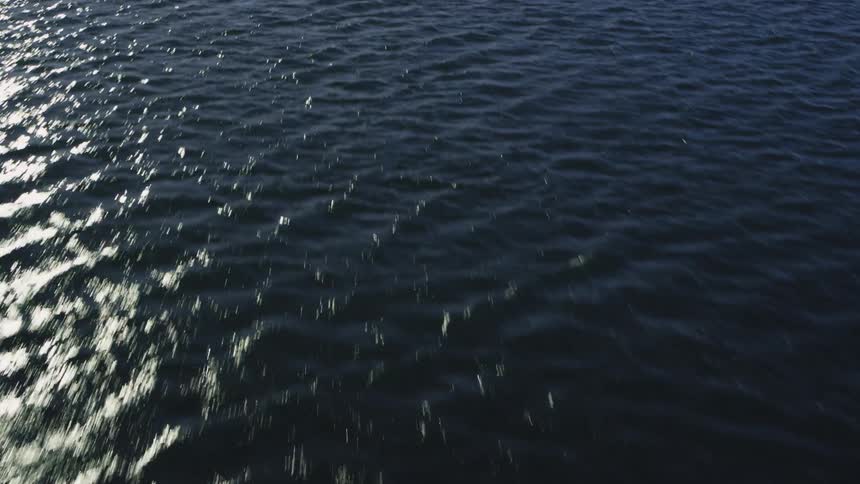 Gentle waves ripple in the open sea