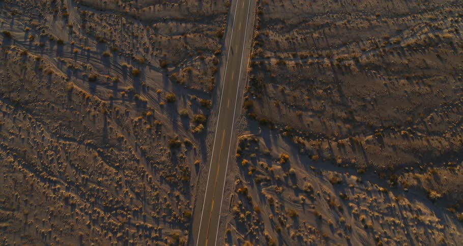 Highway cuts through arid scrub land