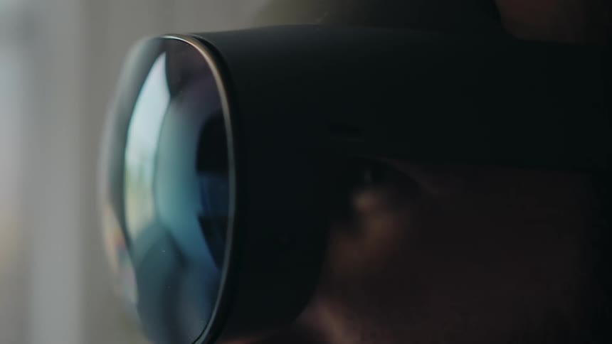 A man wears a virtual reality headset
