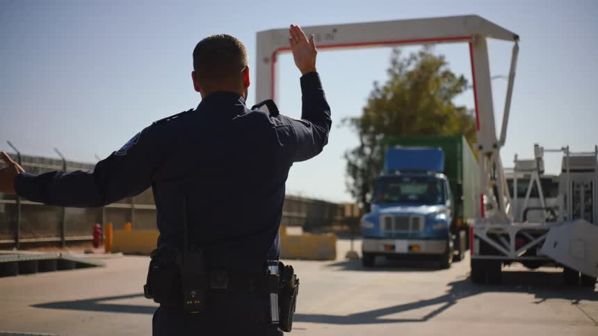 The officer pulls the truck over