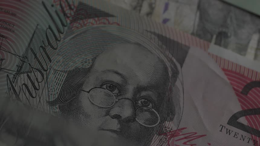 Light moves over a piece of currency