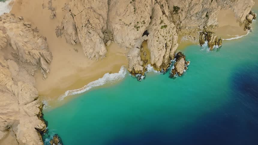 The island is surrounded by blue water