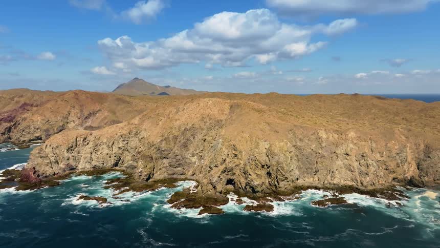 A hill close to a body of water