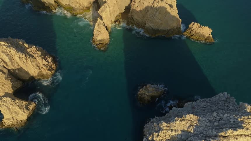 Aerial view of islands in the ocean is displayed