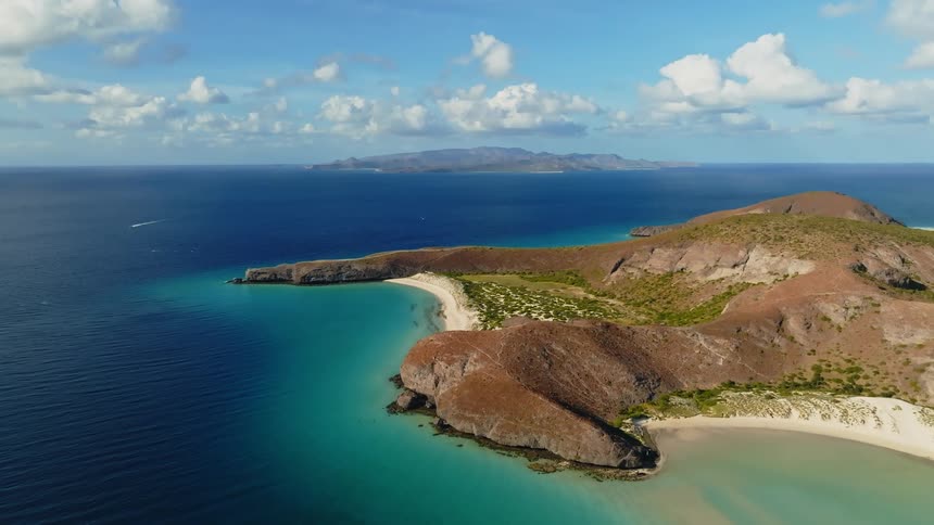 Aerial view of two tropical islands on a sunny day
