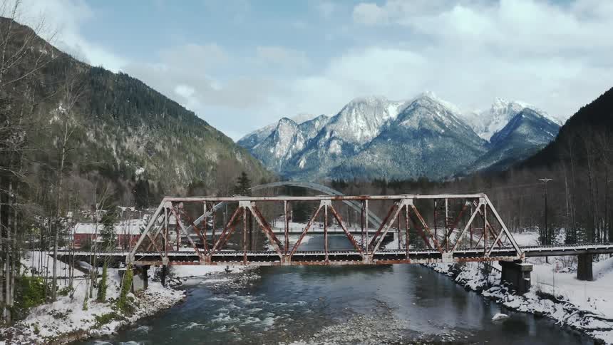 The bridge goes over the stream