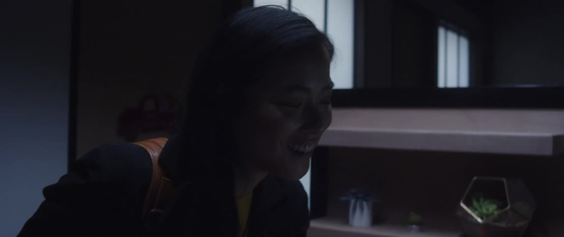 Woman discussing something off screen