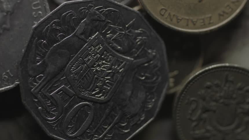 Close-up of foreign currency coins