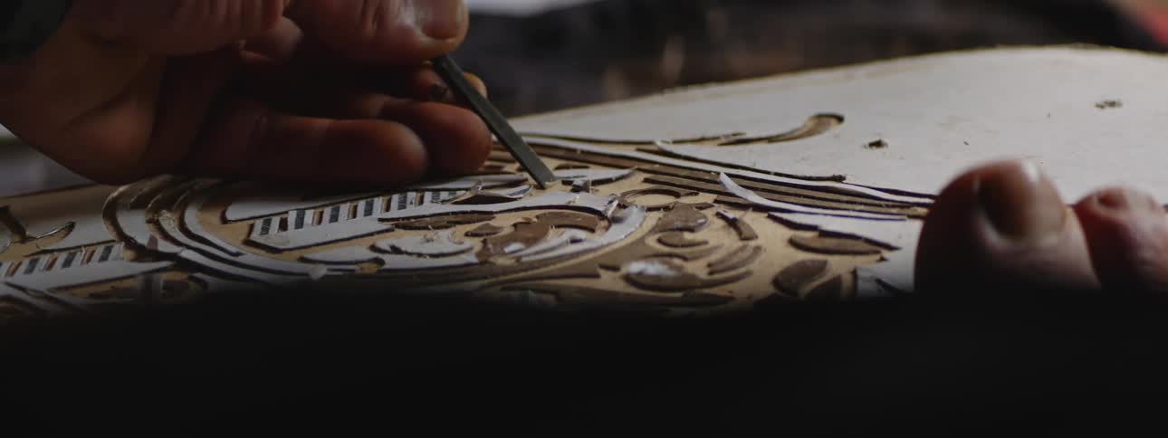 Artisan Crafting Wood with Precision and Skill