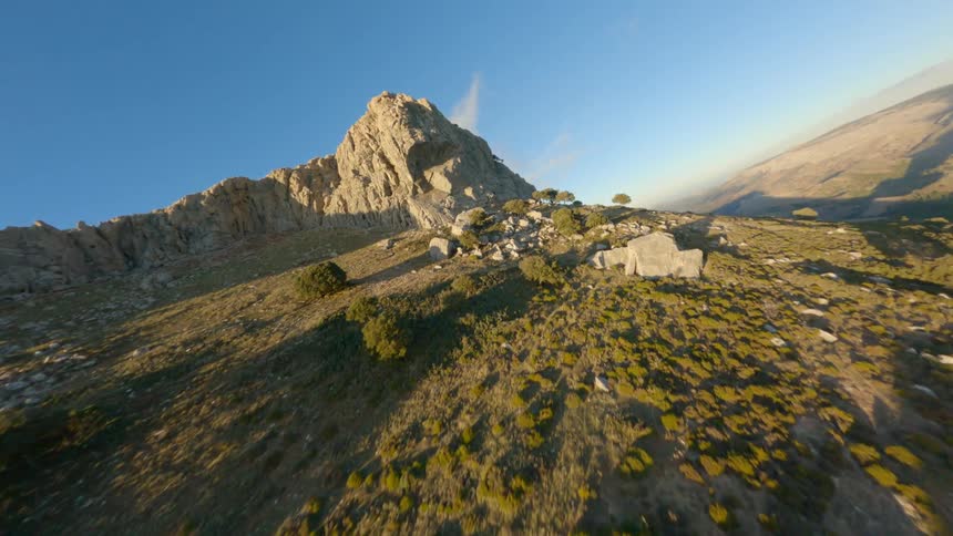 An aerial view of a rocky mountain landscape in nature