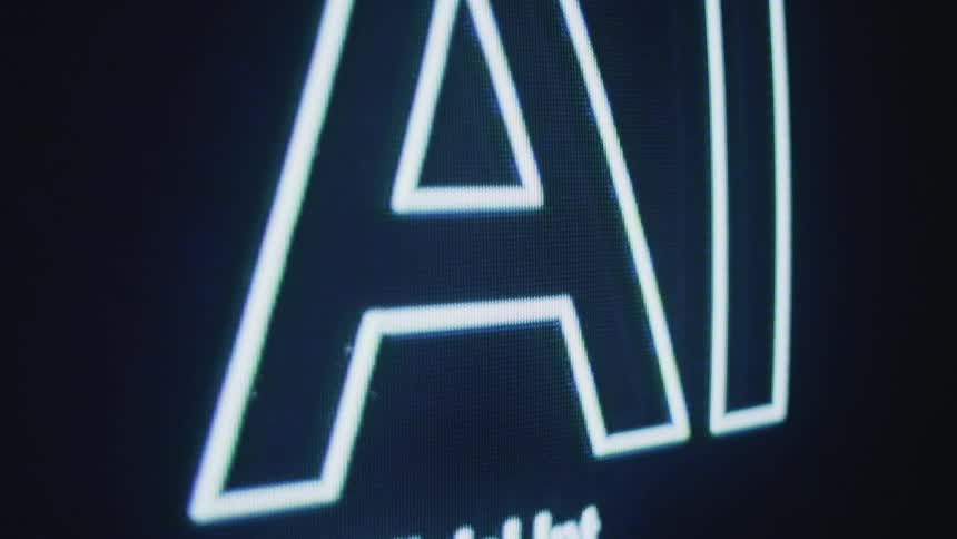 On a screen the letters a and i are shown layered over multiple times