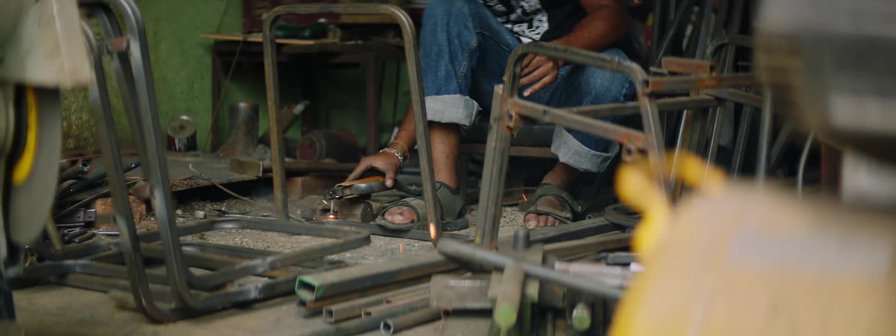 Dynamic Welding Action with Sparkling Metal Frame