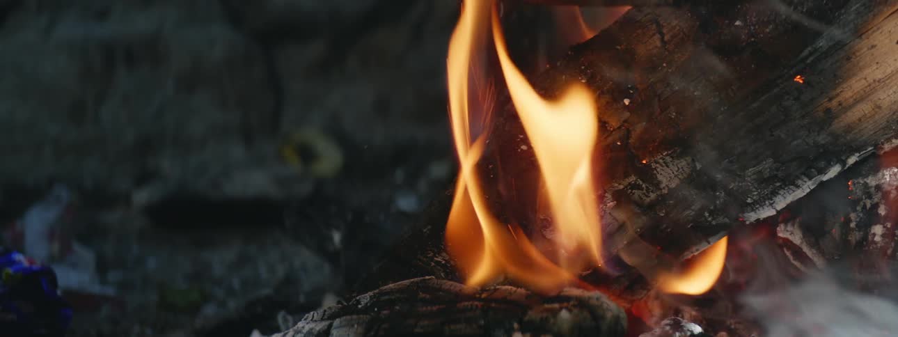 Close up view of a fire and flames is displayed