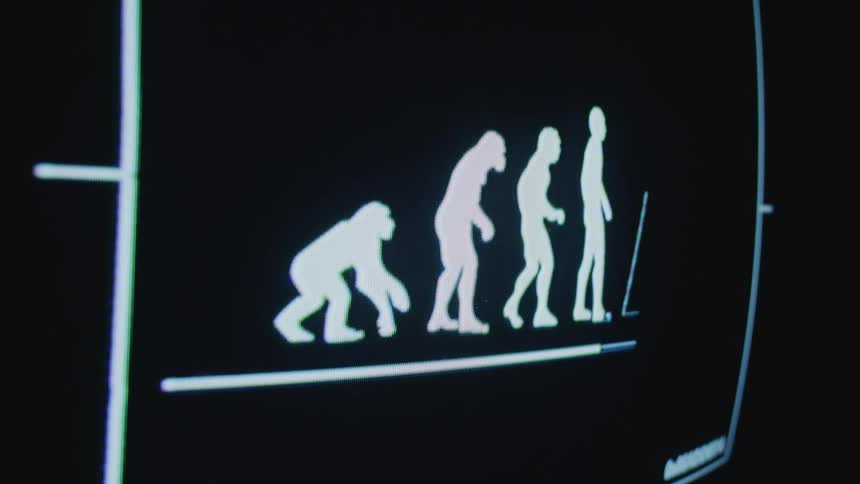 A black computer screen displaying white images of animals evolving to people and then text
