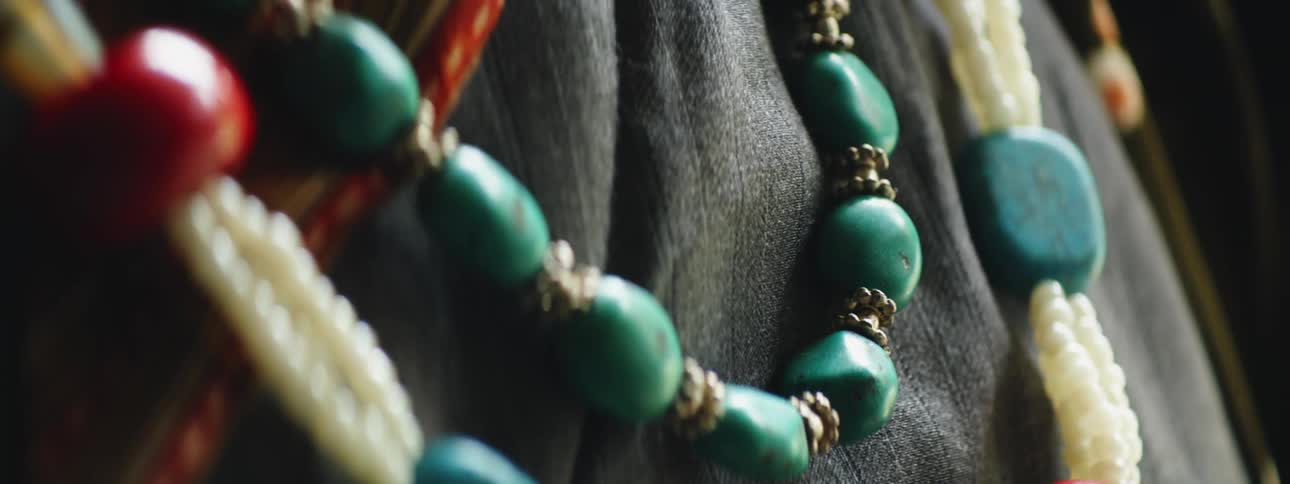 Elegant Green and White Bead Chain Adorns Denim