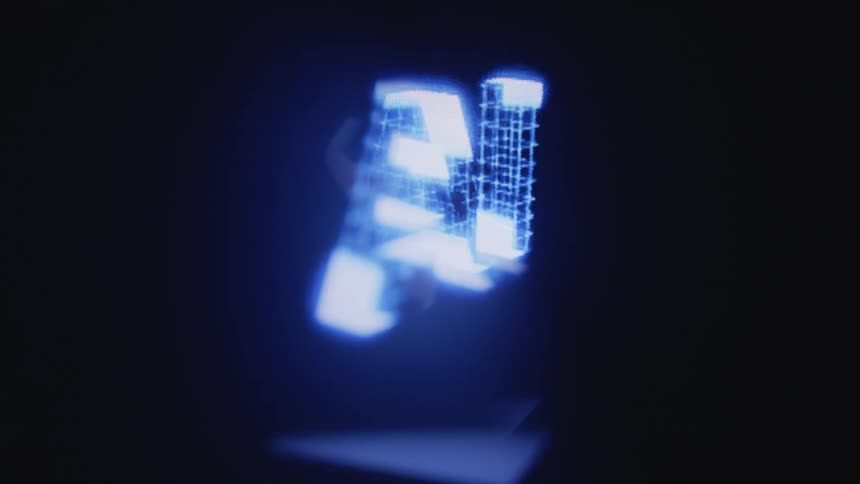 A rotating holographic image of letters and a human brain