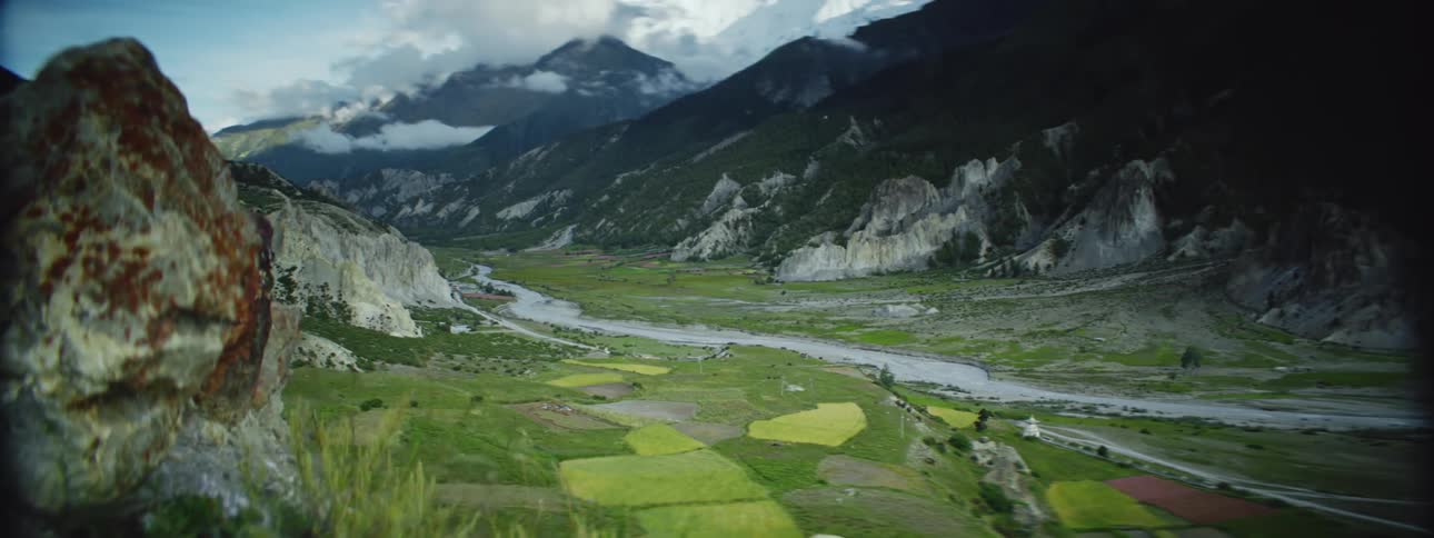 Landscape of valley river and mountain range