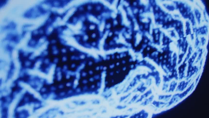Dots and lines form graphic outline of brain in bright blues and white against a black background