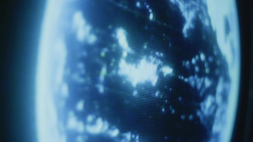 Screen shows rotating image of earth on egg shaped surface