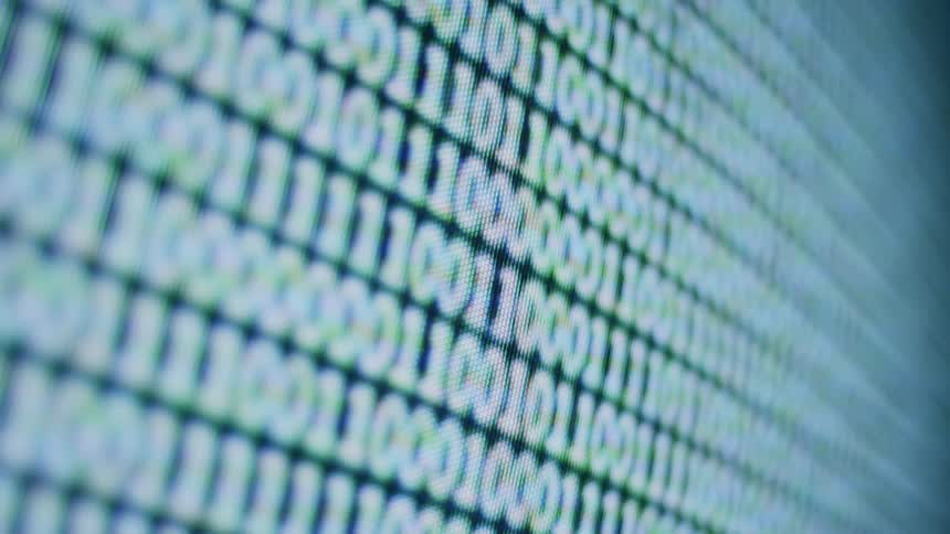 Close up of digital code on screen