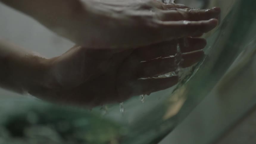 A person is washing their hands