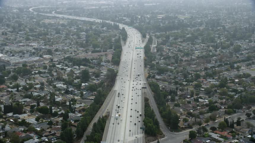 Aerial footage of light traffic on the 118 Freeway in Granada Hills California during a cloudy day