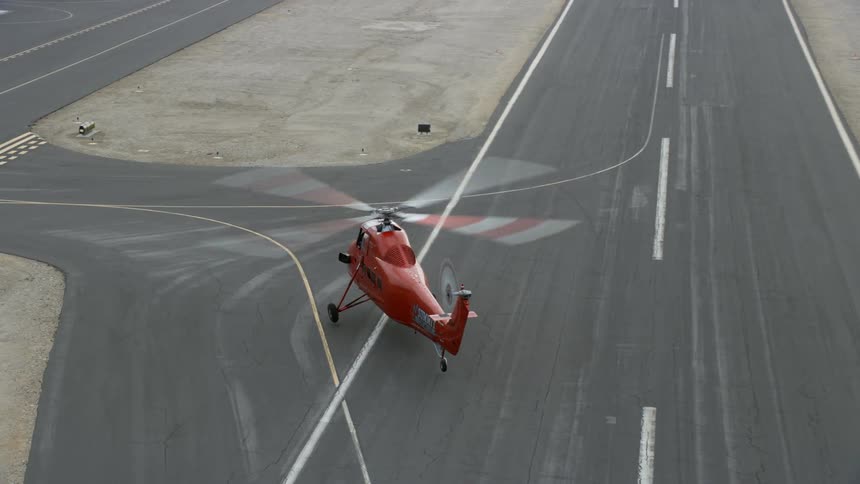 Sikorsky S58T helicopter lands at Whiteman Airport in Pacoima California during daytime aerial shoot