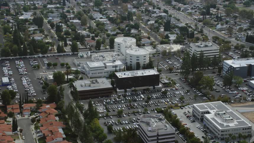 Aerial footage of the West Hills Hospital complex in West Hills California on a cloudy day