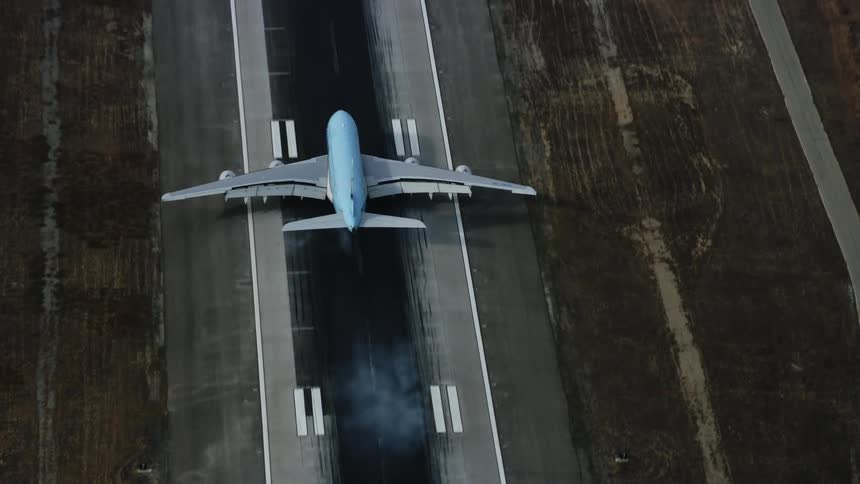 Korean Air A380 lands at LAX viewed from above during a cloudy summer day