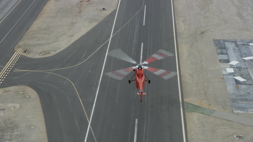 Sikorsky S58T helicopter captured landing at Whiteman Airport in Pacoima CA during summer in an epic aerial view