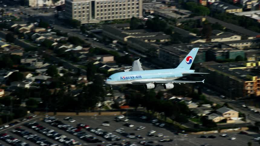 Korean Air A380 lands at LAX during daytime shot from above with an aerial view in resolution