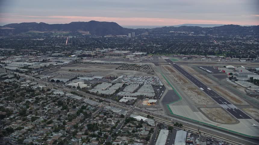 A breathtaking aerial view of Burbank airport runways during twilight