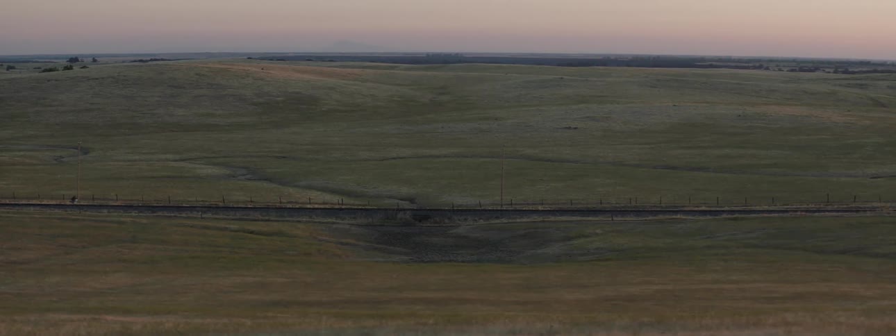 Aerial view of a rural area while the sun is setting